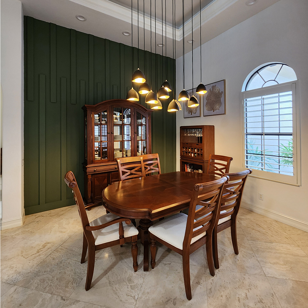 Modern kitchenette with sleek cabinetry and countertops designed by Steele Design Solutions in Naples FL.