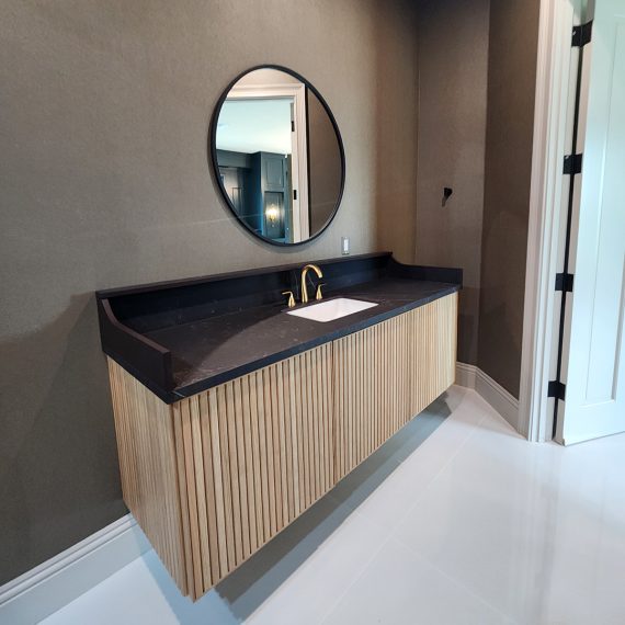 Modern bathroom design with sleek fixtures and clean lines by Steele Design Solutions in Naples FL.