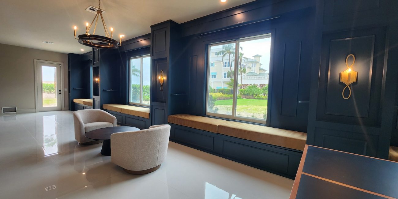 Minimalist staging by Steele Design Solutions in Naples, FL, showcasing bold statement pieces and clean, elegant design.